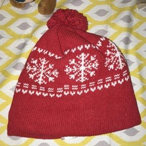 Girls winter hat. Red with white snowflakes. Fleece line on the inside.